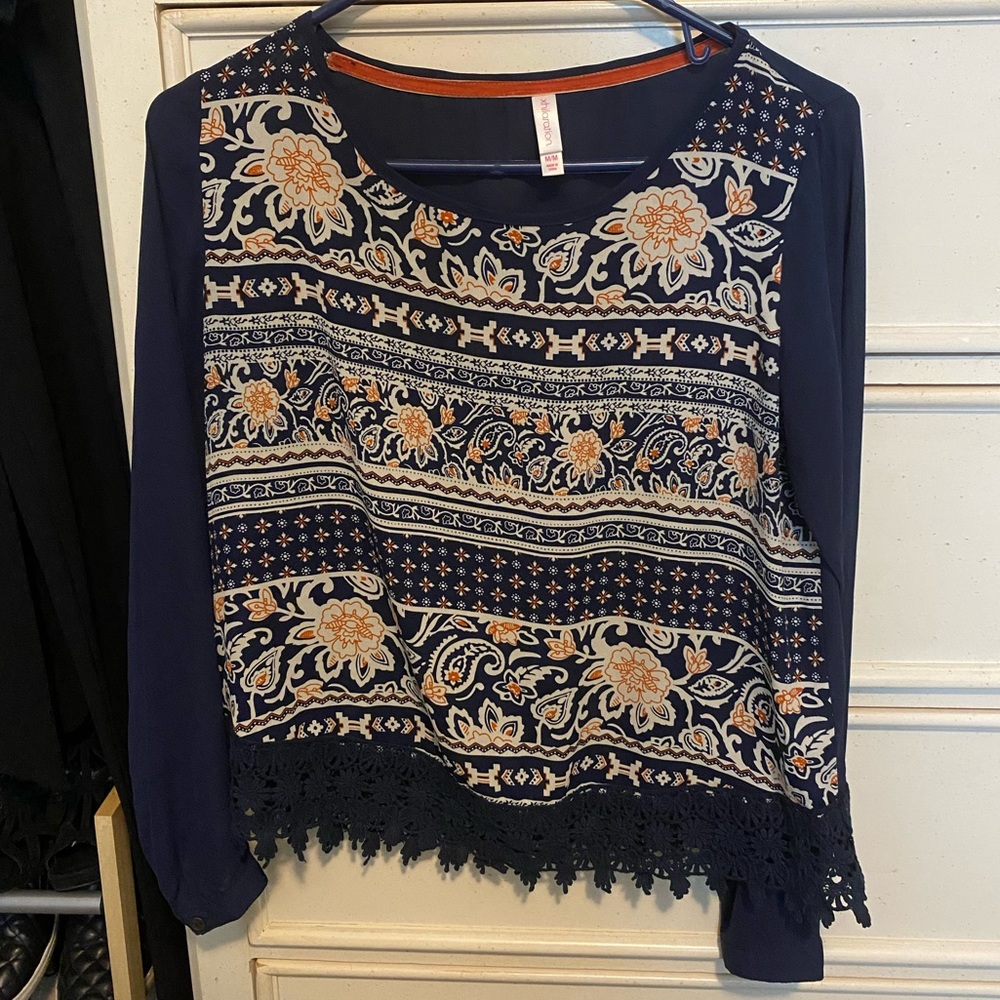 Dark blue shirt with a unique design on the front